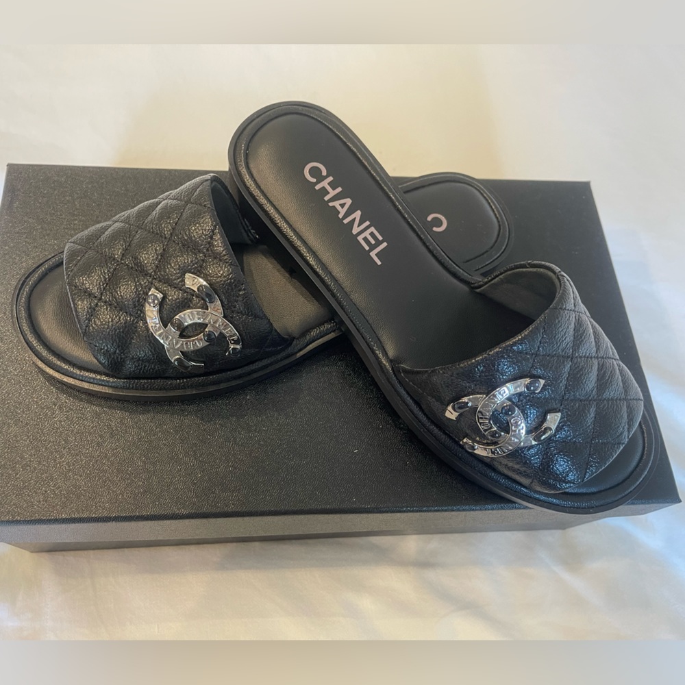 Brand new, never worn CHANEL slides